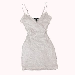 White lace mini dress with dotted trim